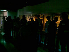 MCG people looking at projected displays at the Maritime Museum, Swansea